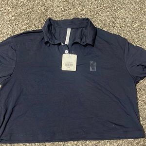 NWT size medium cropped fabletics polo